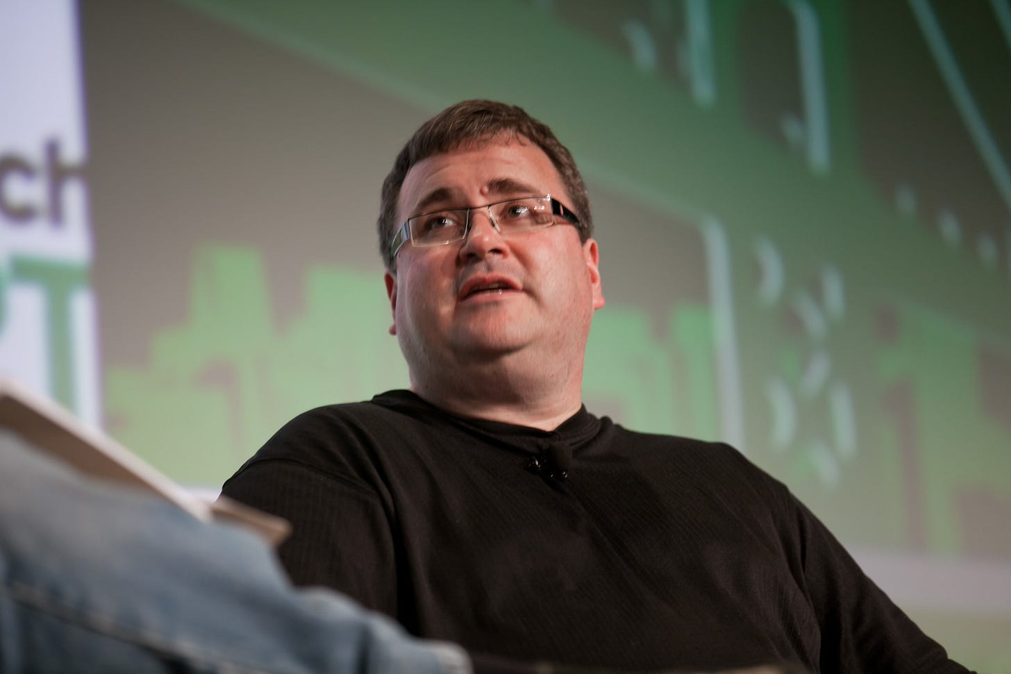 Reid Hoffman speaking onstage Reid Hoffman speaking onstage