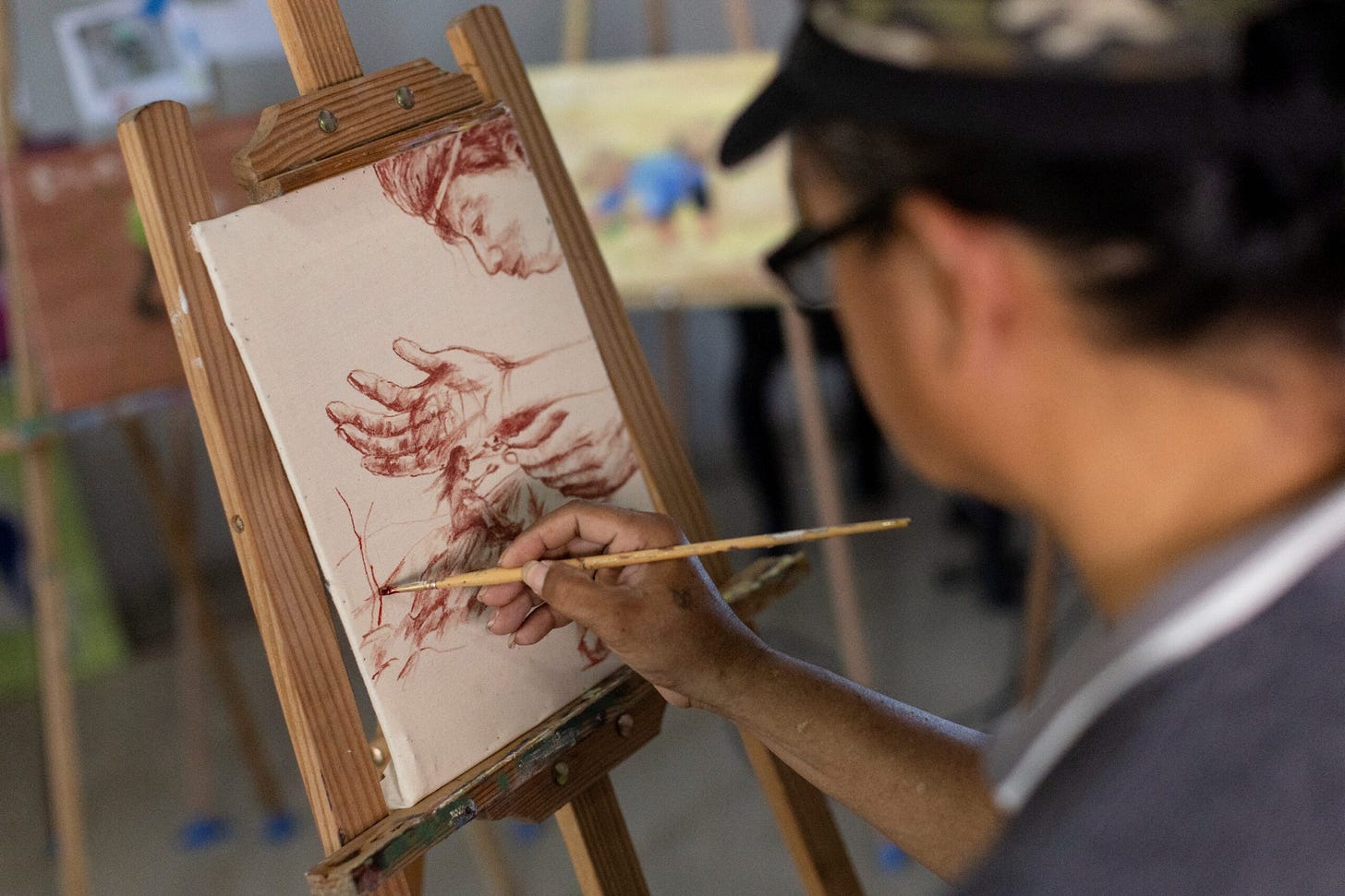 Filipino artist creates paintings using his own blood Filipino artist creates paintings using his own blood