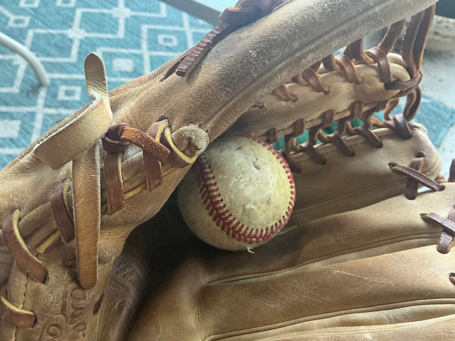 Fielders glove and baseball