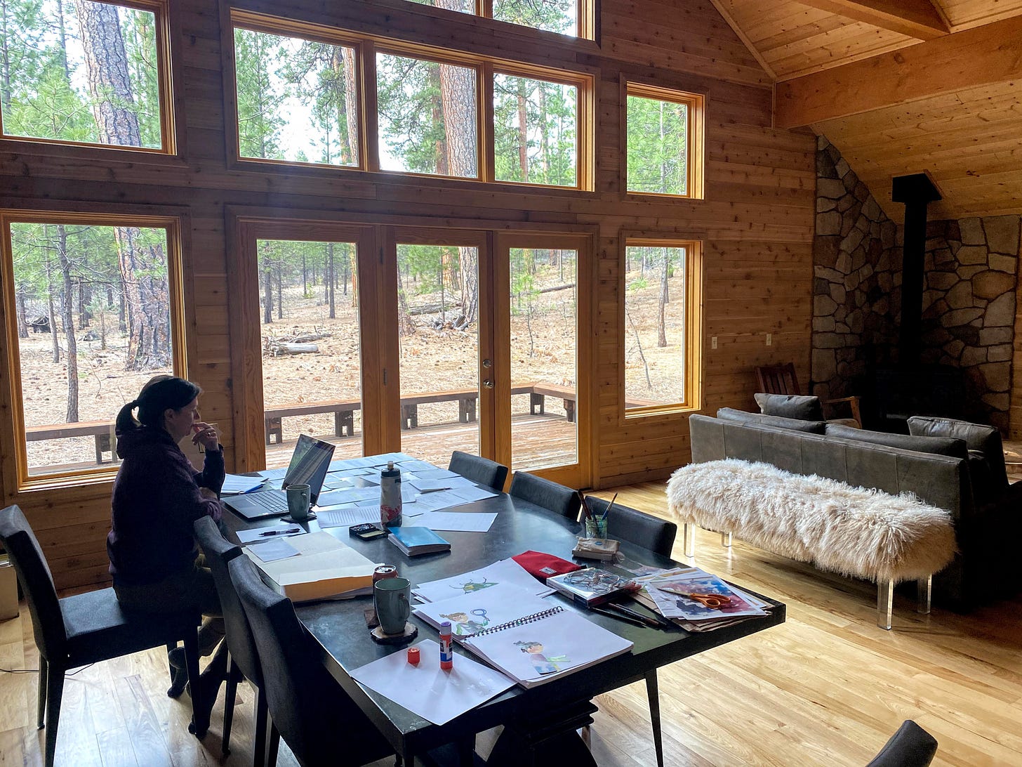 Meghan writing in a house in the woods Meghan writing in a house in the woods
