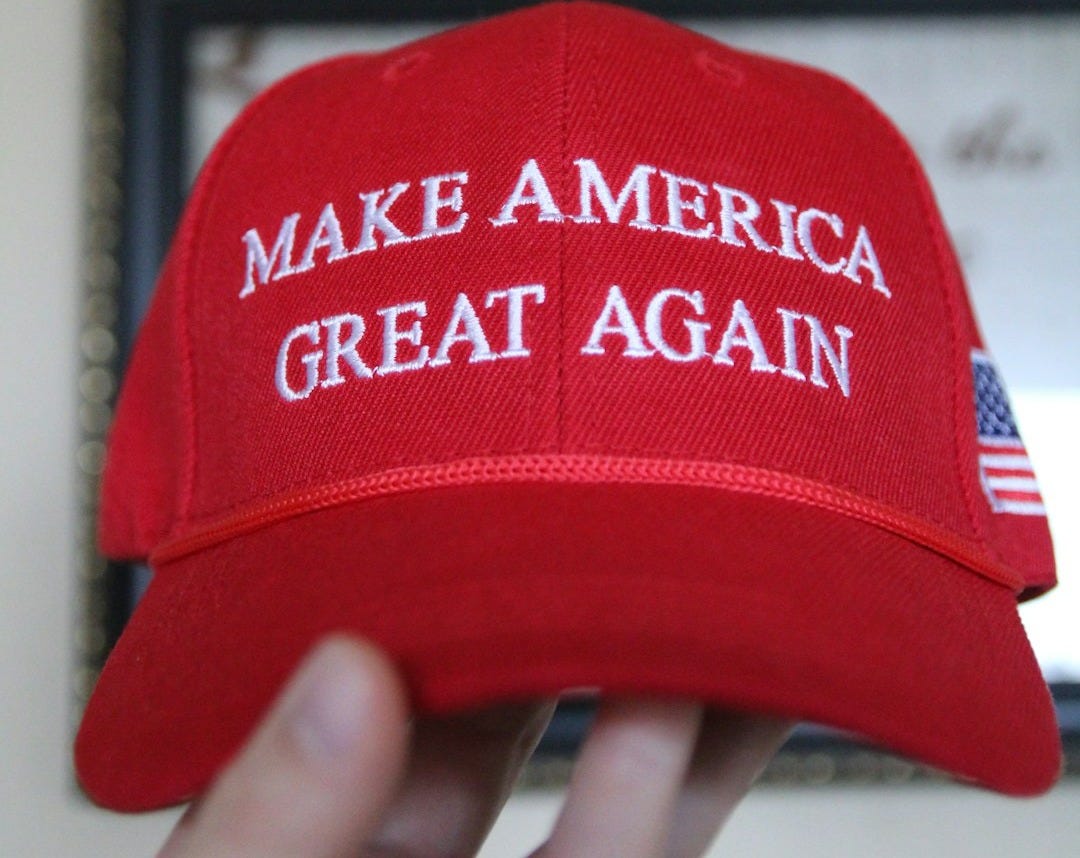 a red hat that says make america great again