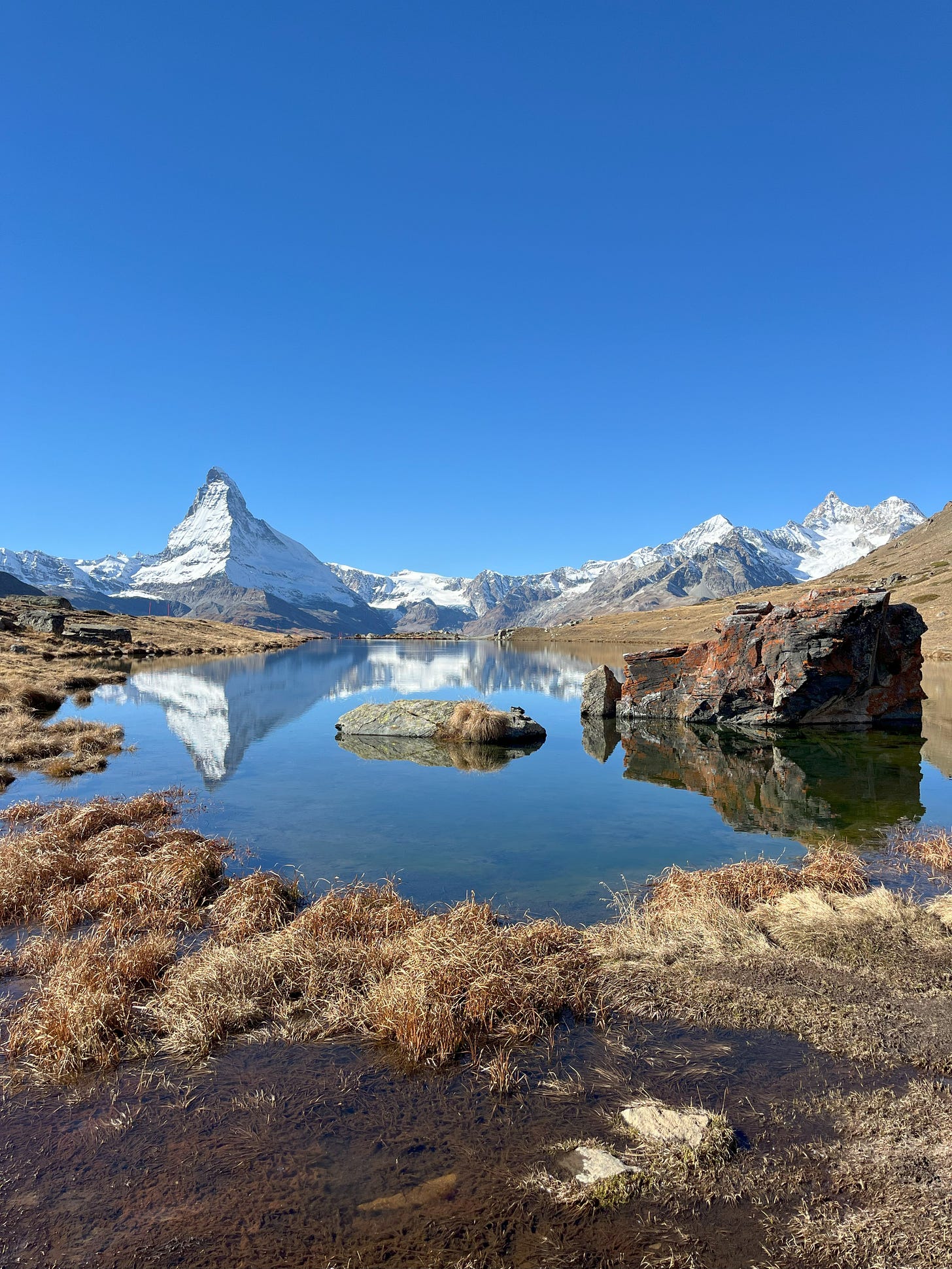 The Matterhorn on an autumn day reflected in Stellisee