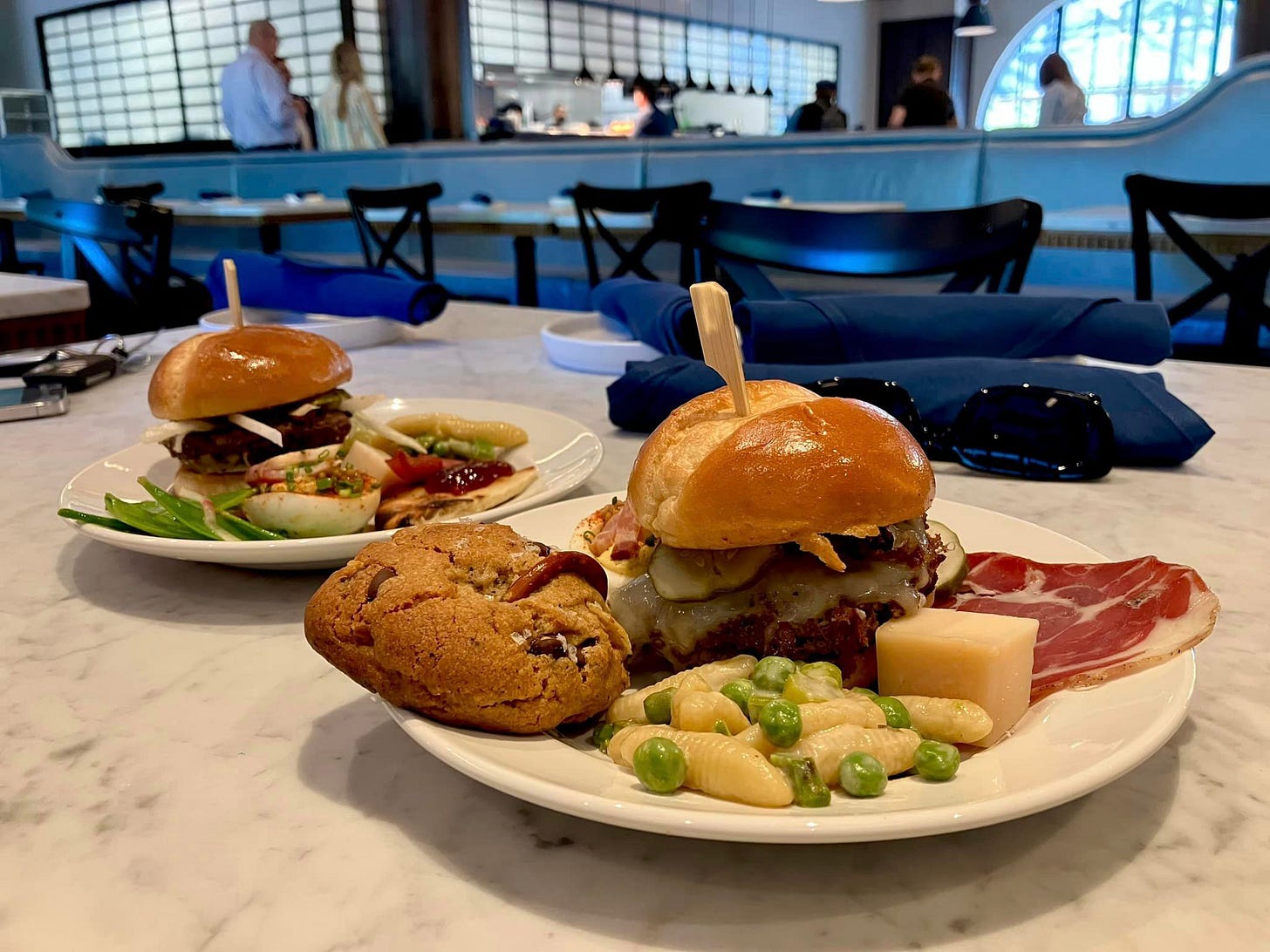 May be an image of 6 people, club sandwich and chicken sandwich