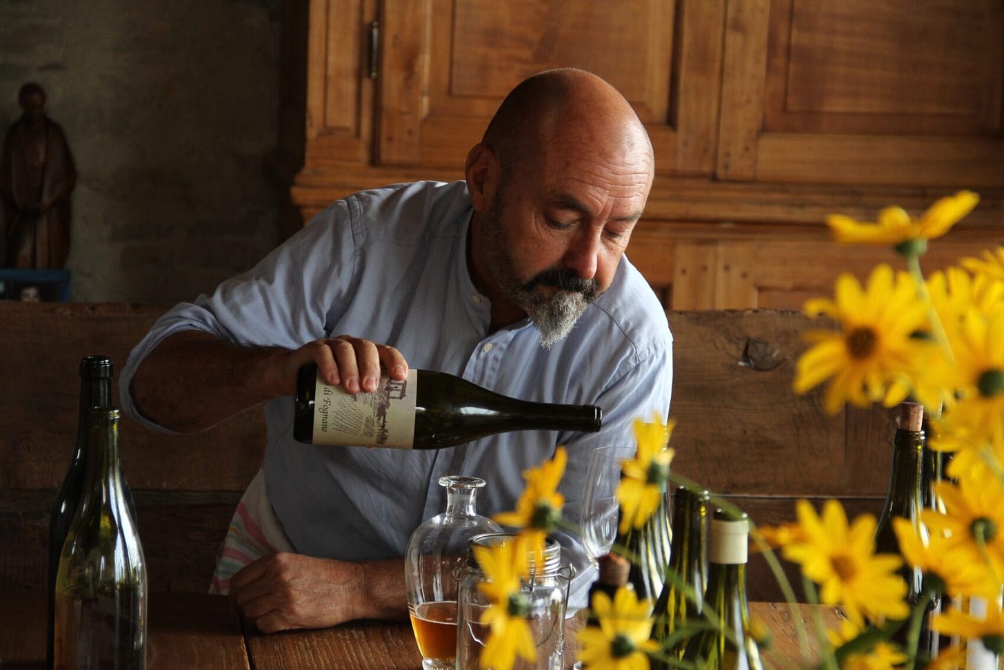 Giulio Armani (Denavolo) pours a glass. Photo (C) Simon J Woolf