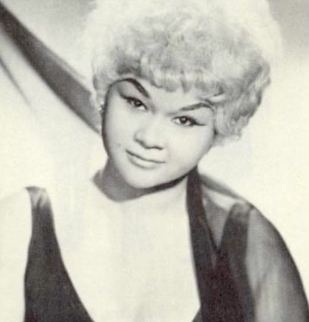 young etta james with blonde hair and a gown