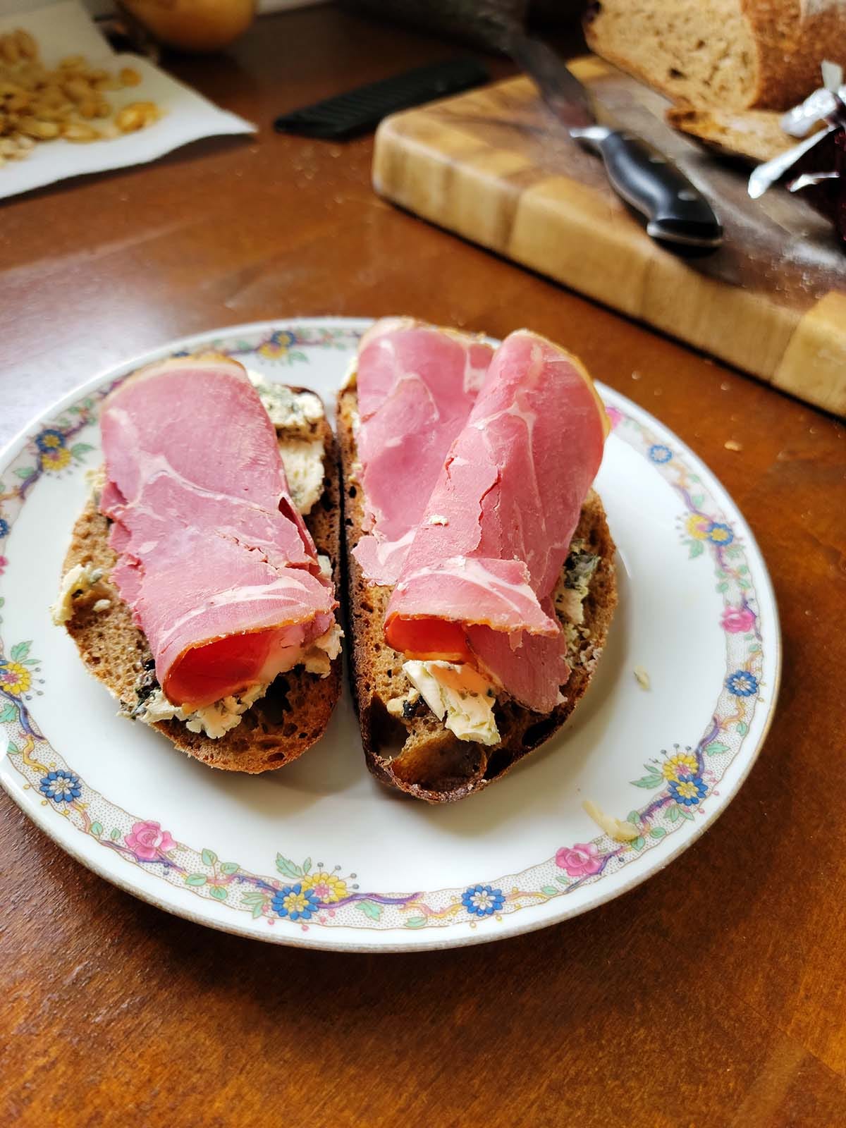 Smoked mutton on toast on the kitchen counter. 