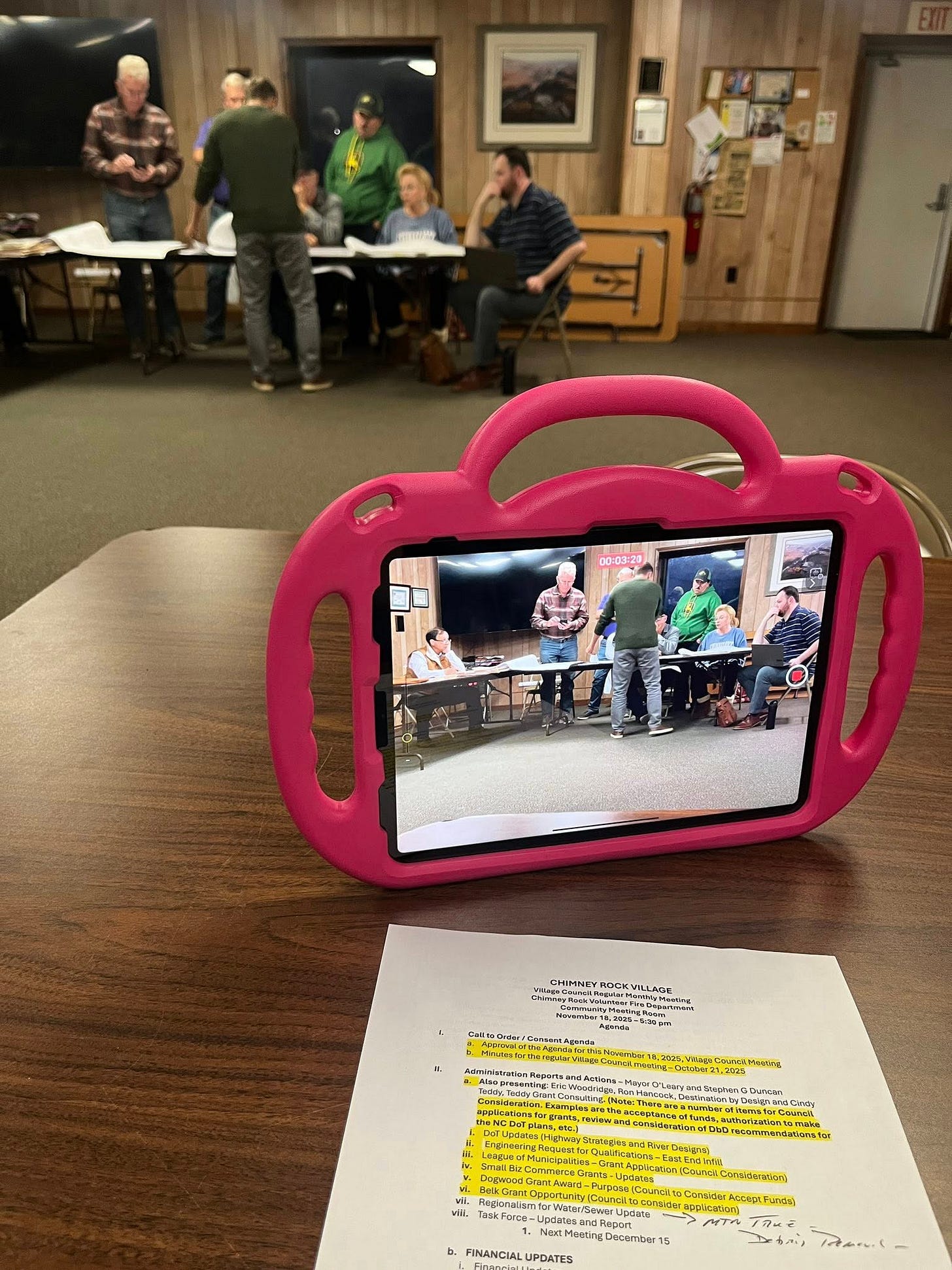 May be an image of studying, television and text