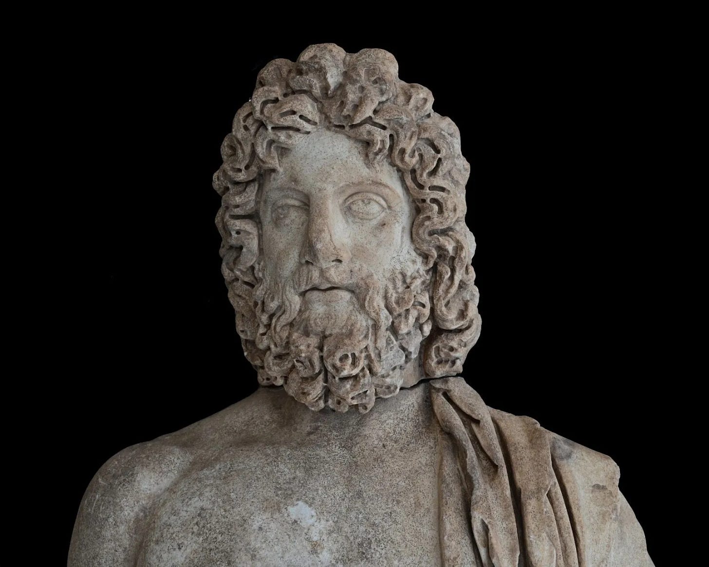 The head of Asclepius from the Aspendos group, showing the heavy working of the hair and beard that Ersoy cited as characteristic of the period. The head of Asclepius from the Aspendos group, showing the heavy working of the hair and beard that Ersoy cited as characteristic of the period.