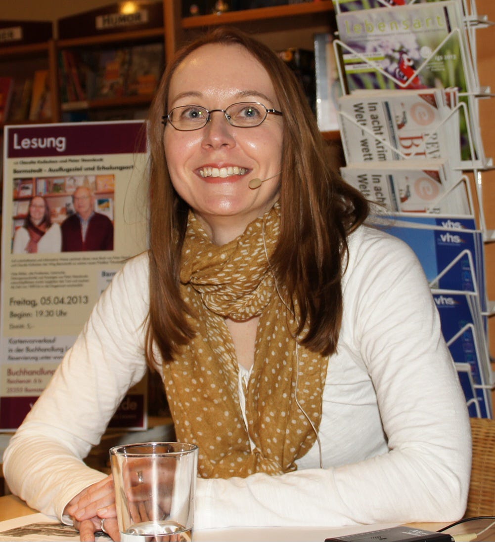 Claudia Kollschen at a reading in a bookshop 2013 - Photo by Eva Steenbuck