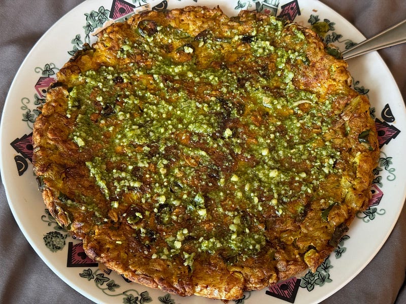 Omelette with Oatmeal and veggies, topped with Pesto (Photo by Author)
