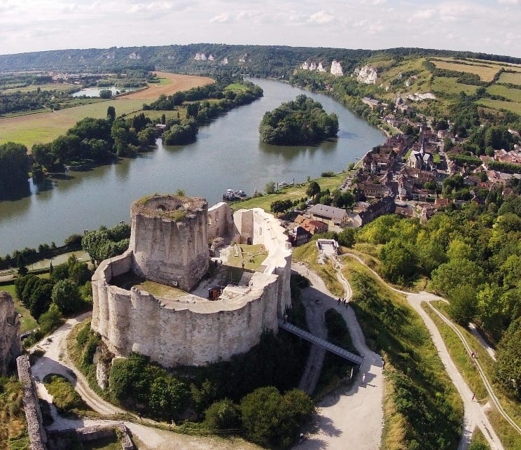 The ruins of a castle in grey limestone. It dominates the landscape. The ruins of a castle in grey limestone. It dominates the landscape.