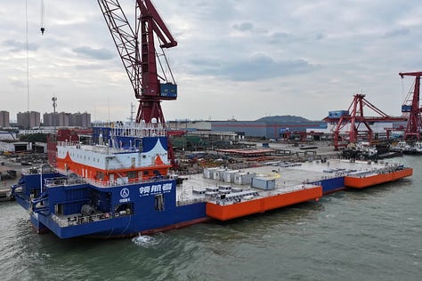 'Linghangzhe' during its delivery ceremony and sailing under its own power.