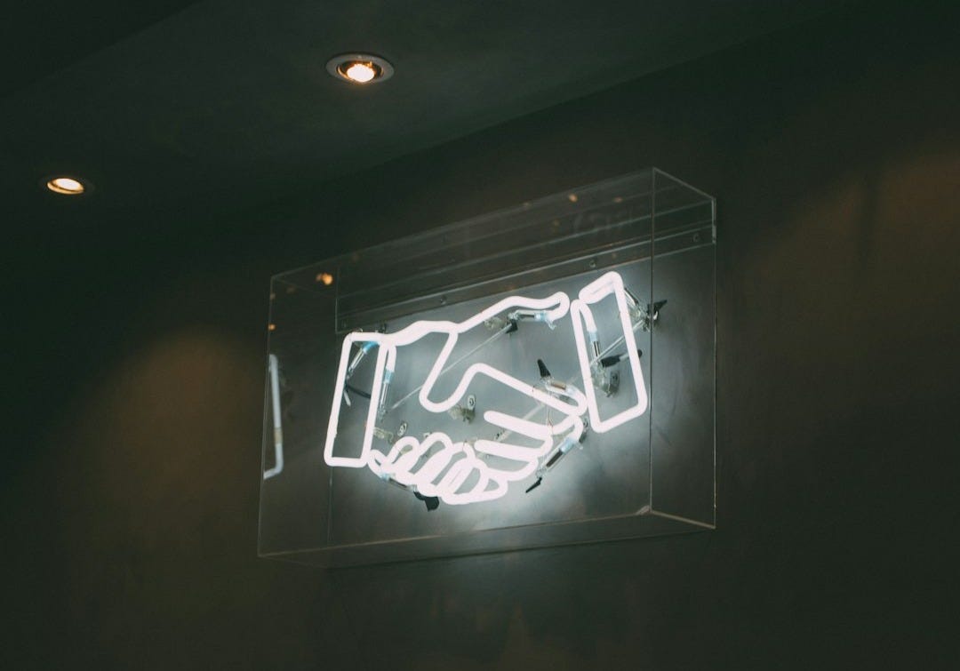 human hand neon signage human hand neon signage