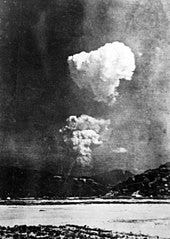 Another view of the mushroom cloud forming, from further away. Another view of the mushroom cloud forming, from further away.