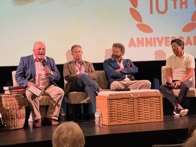 A group of people sitting on a stage
AI-generated content may be incorrect. A group of people sitting on a stage
AI-generated content may be incorrect.