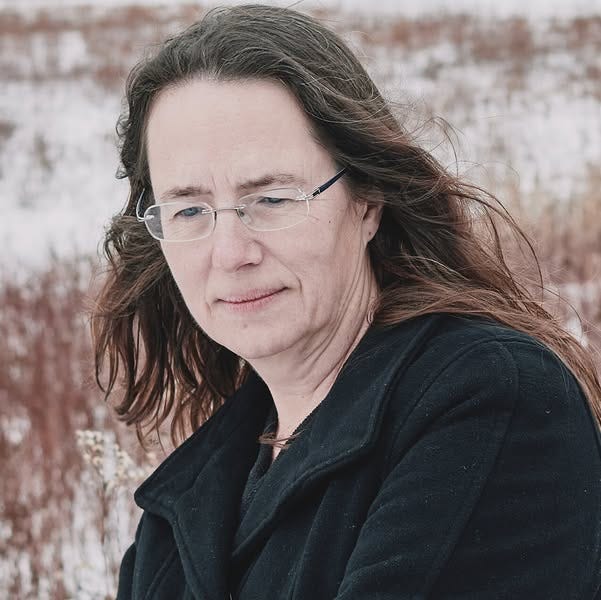 May be an image of 1 person, eyeglasses and arctic