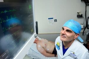 Dr. Robert Stevens, chief of the Division of Informatics, Integration and Innovation at Johns Hopkins Medicine, observes an electrocardiogram monitor.