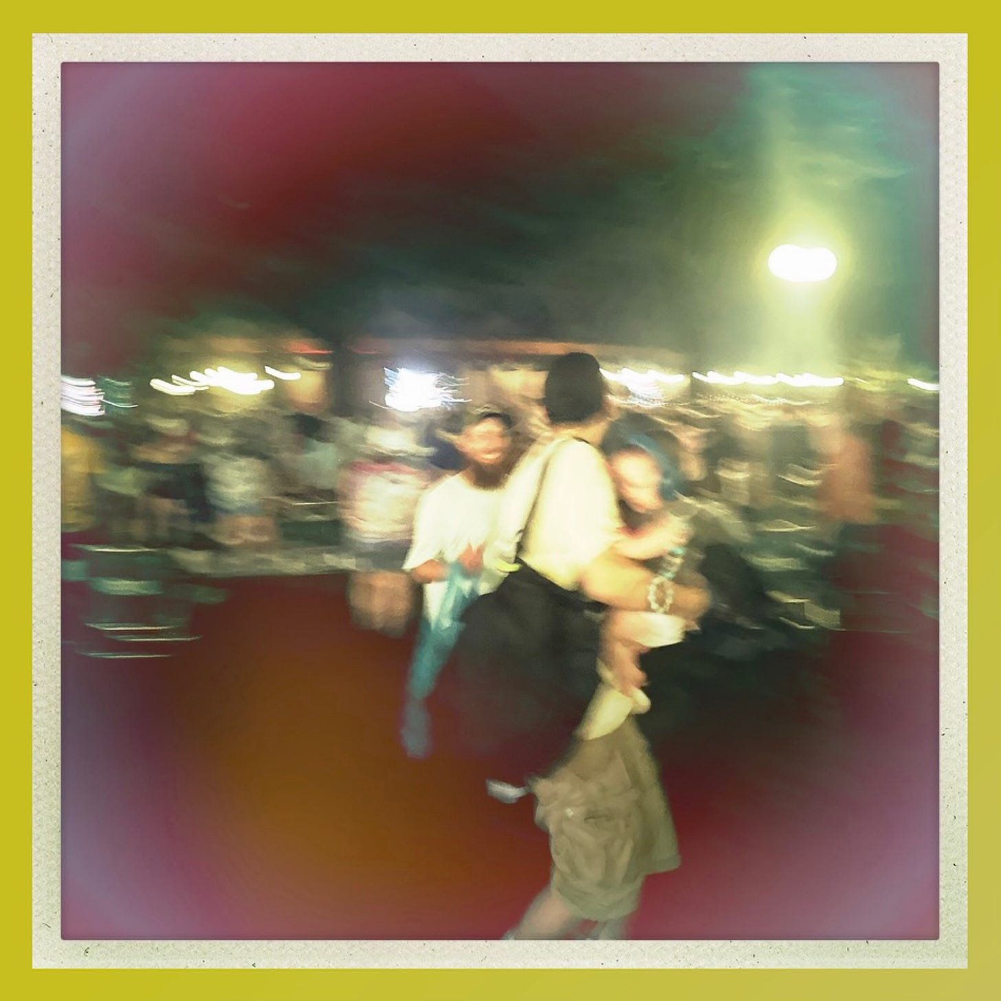 guy with baby at concert