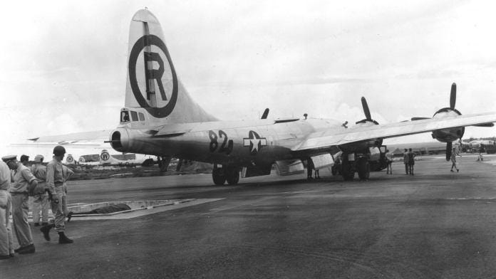 View of the B-29 Superfortress 'Enola Gay' as it is manouvered over the bomb pit on the North Field of Tinian airbase, North Marianas Islands, early August, 1945. The plane was loaded with an atomic bomb, codenamed 'Little Boy,' which it then dropped on the Japanese city of Hiroshima on August 6. (Photo by PhotoQuest/Getty Images) View of the B-29 Superfortress 'Enola Gay' as it is manouvered over the bomb pit on the North Field of Tinian airbase, North Marianas Islands, early August, 1945. The plane was loaded with an atomic bomb, codenamed 'Little Boy,' which it then dropped on the Japanese city of Hiroshima on August 6. (Photo by PhotoQuest/Getty Images)