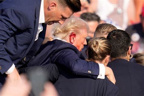 May be an image of 3 people and people playing soccer
