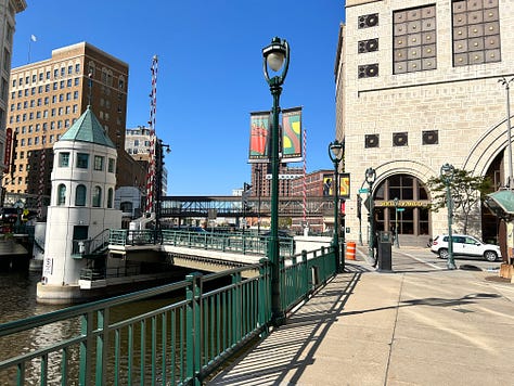 river, walkway, sculptures