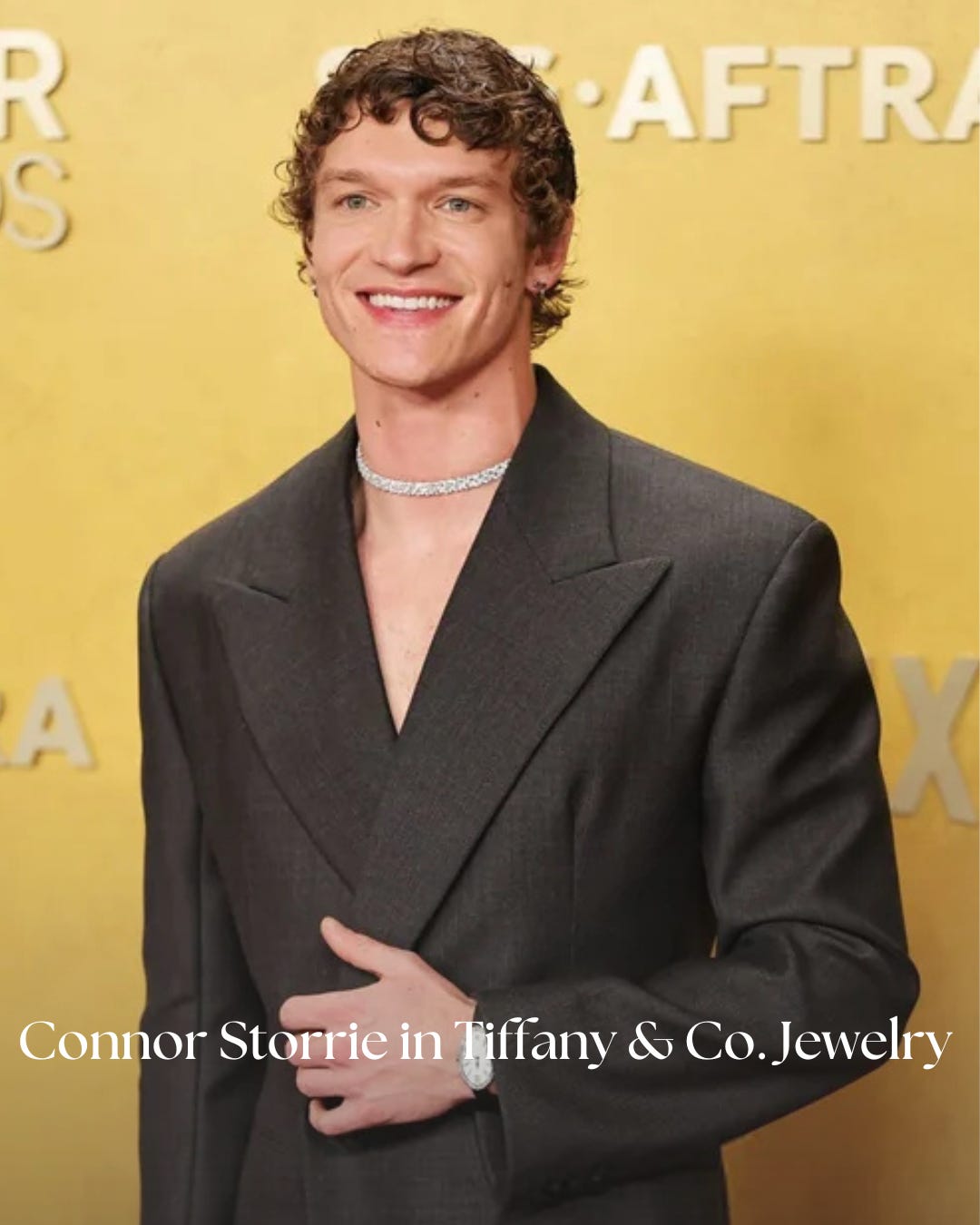 Connor Storrie wearing diamond jewelry by Tiffany & Co. at the Actors Awards 2026 red carpet event.