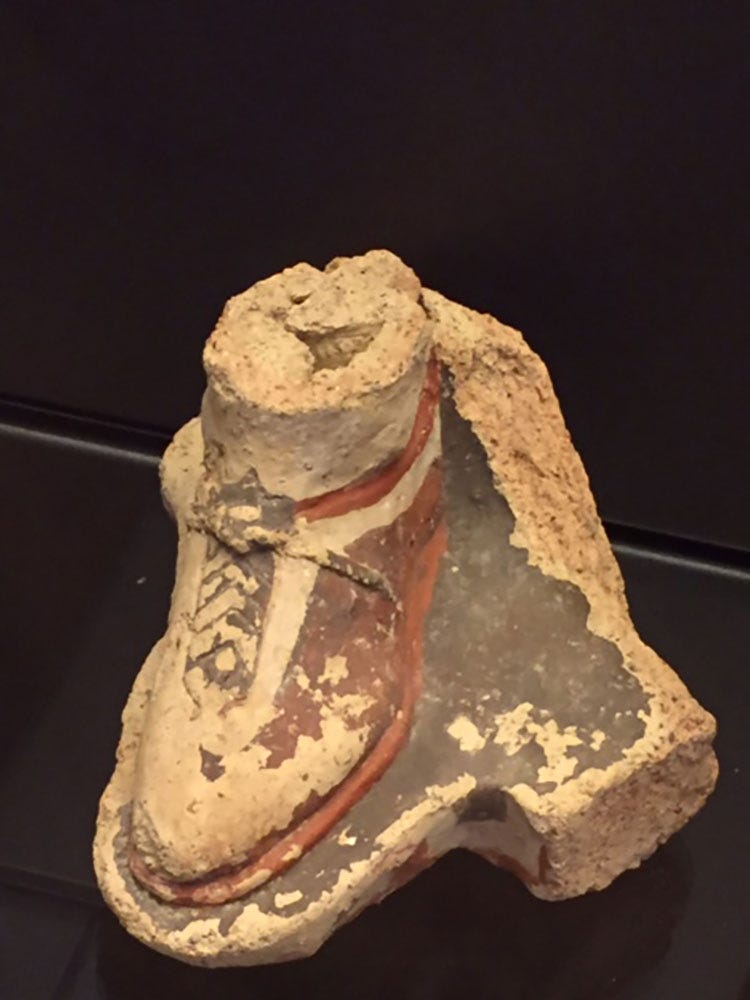 A stone object with a shoe on it
AI-generated content may be incorrect. A stone object with a shoe on it
AI-generated content may be incorrect.