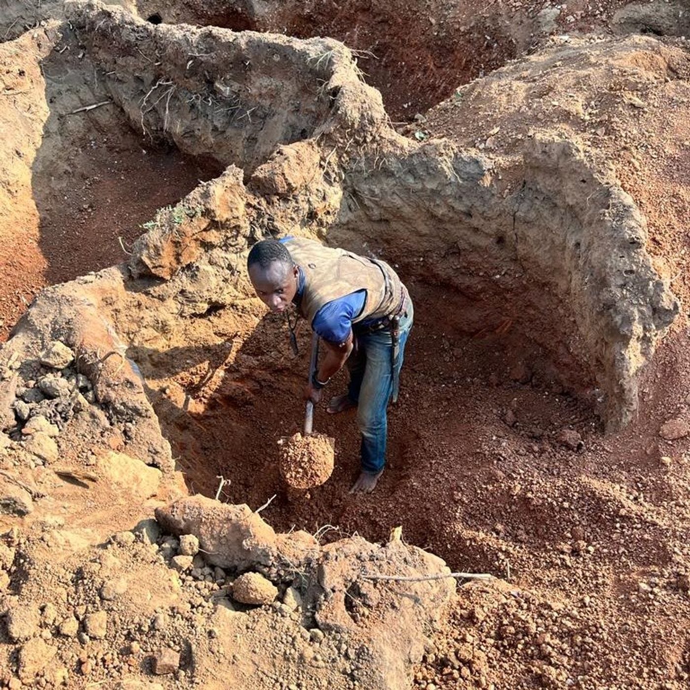 Photo: A Galamsey worker manually digging for gold. Credit: Kawtey, CC BY-SA 4.0 via Wikimedia Commons