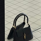 I love this uncomfortable and impractical purse