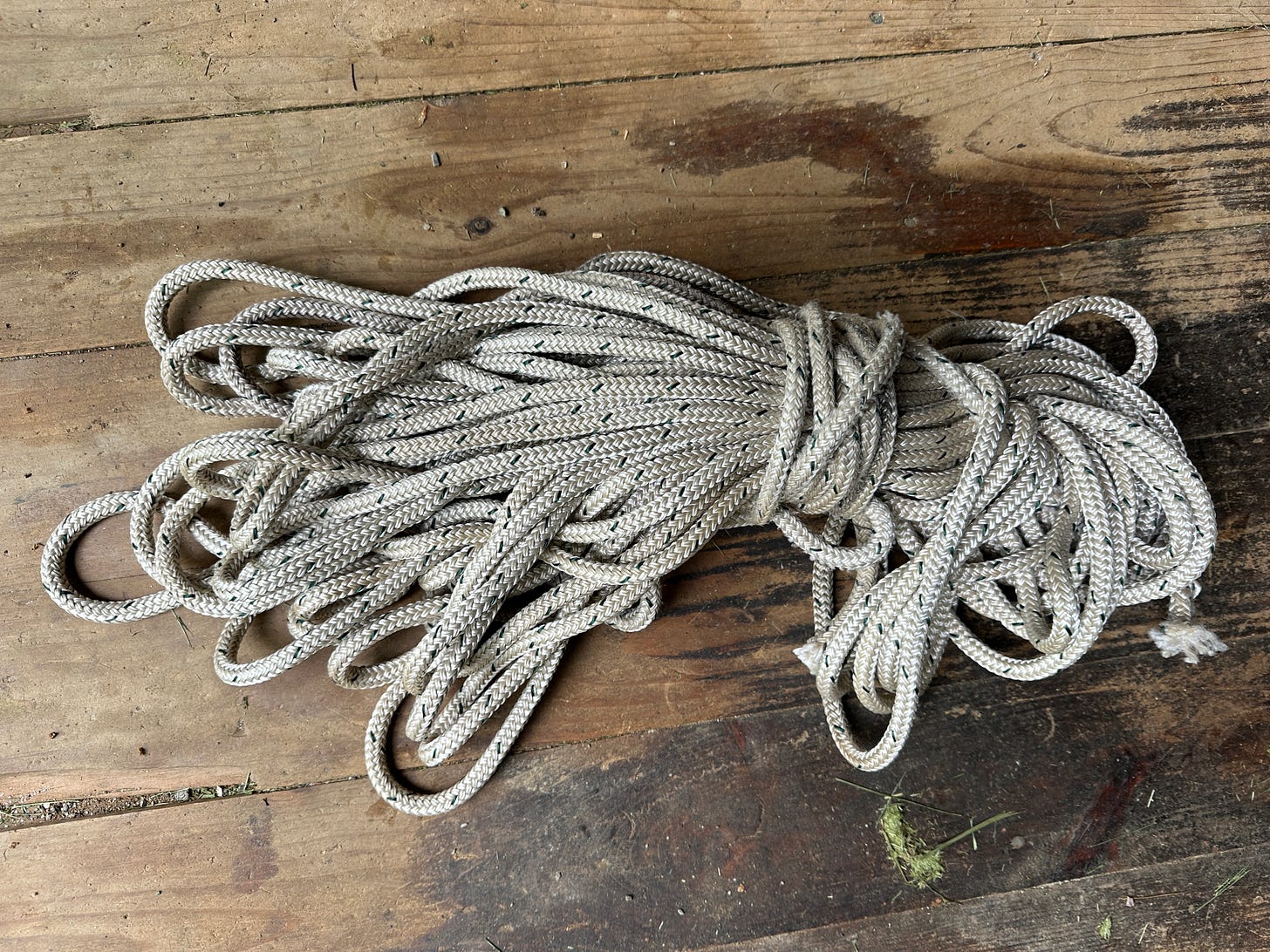 Bunch of rope on shed floor. Bunch of rope on shed floor.