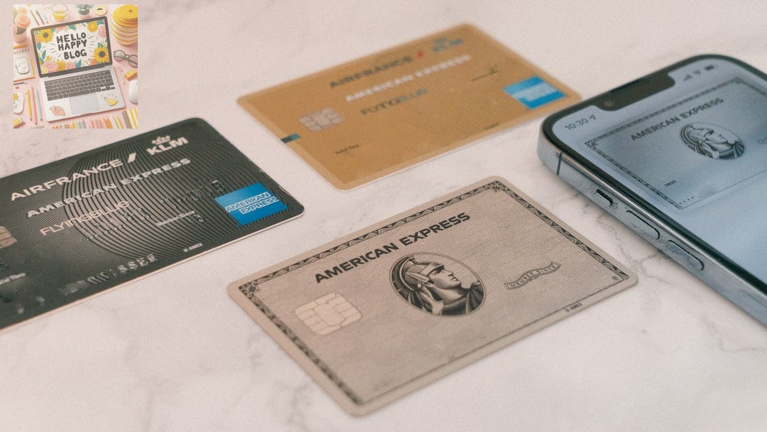 a group of credit cards sitting next to a cell phone