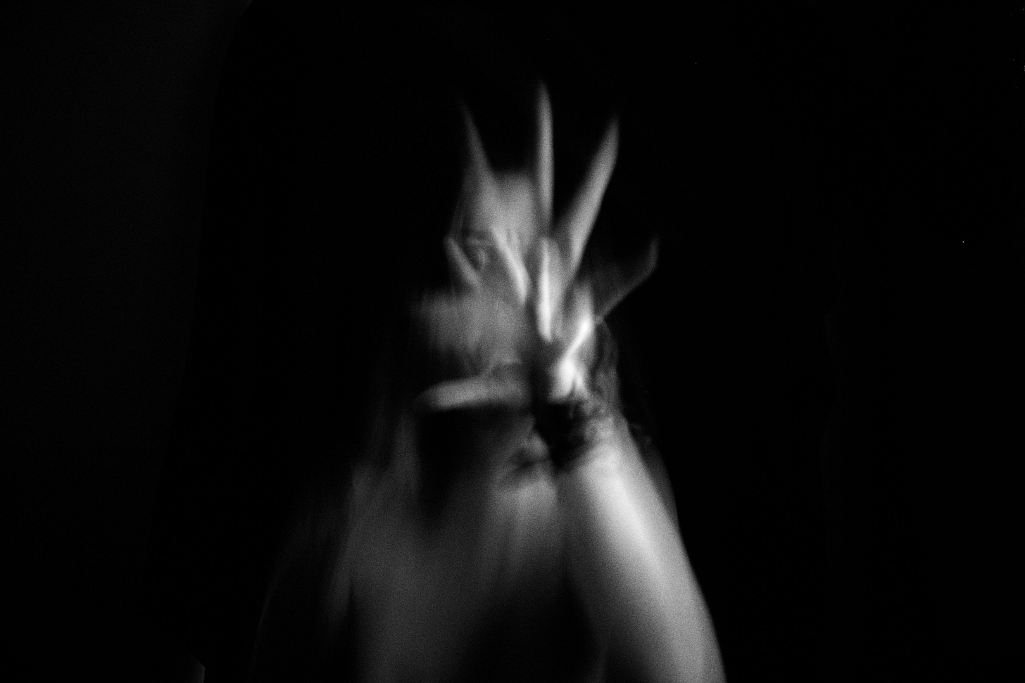 A disorientating image of a person in black and white