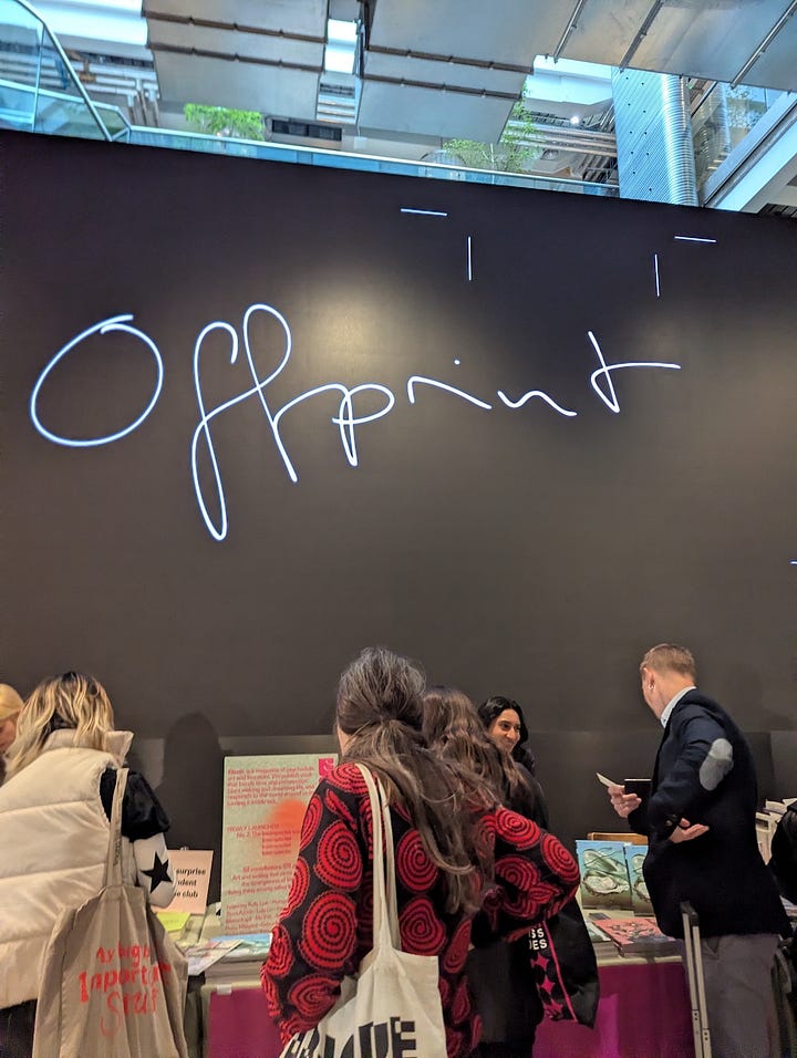 Exterior of 180 Studios on The Strand and Inside Offprint London, visitors browse books at a table beneath a dramatic dark wall with the word "Offprint" rendered in flowing neon light script.