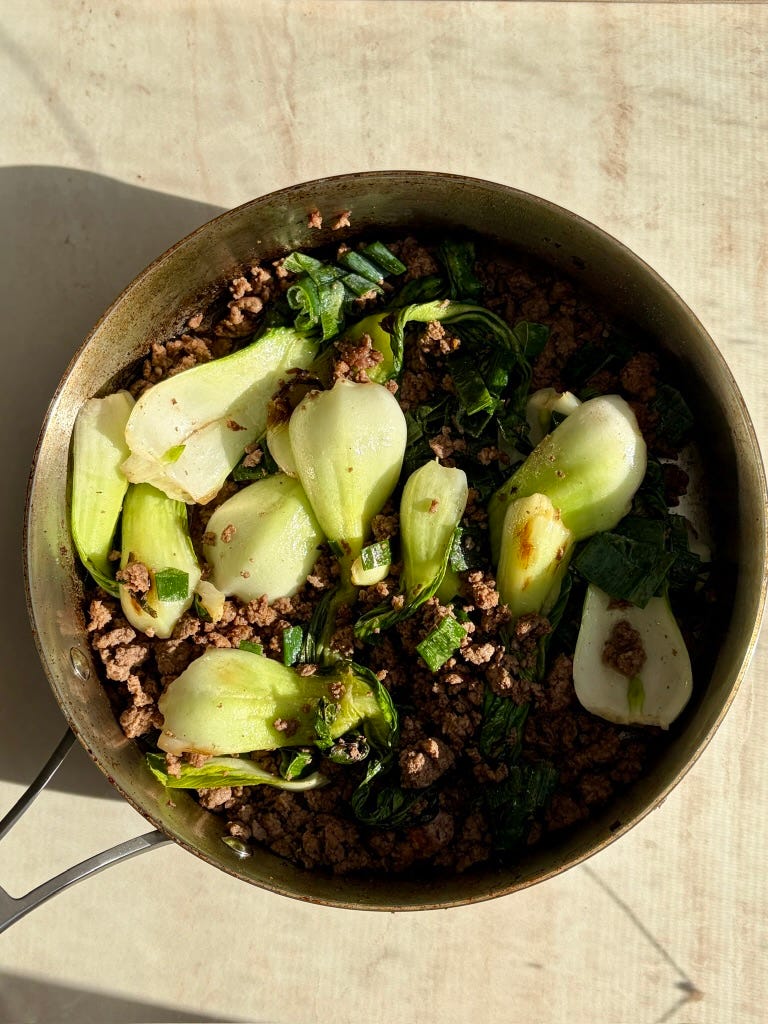 beef and bok choy in a skillet beef and bok choy in a skillet