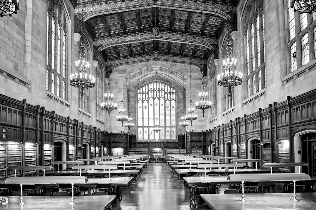 building interior with chandeliers and desks