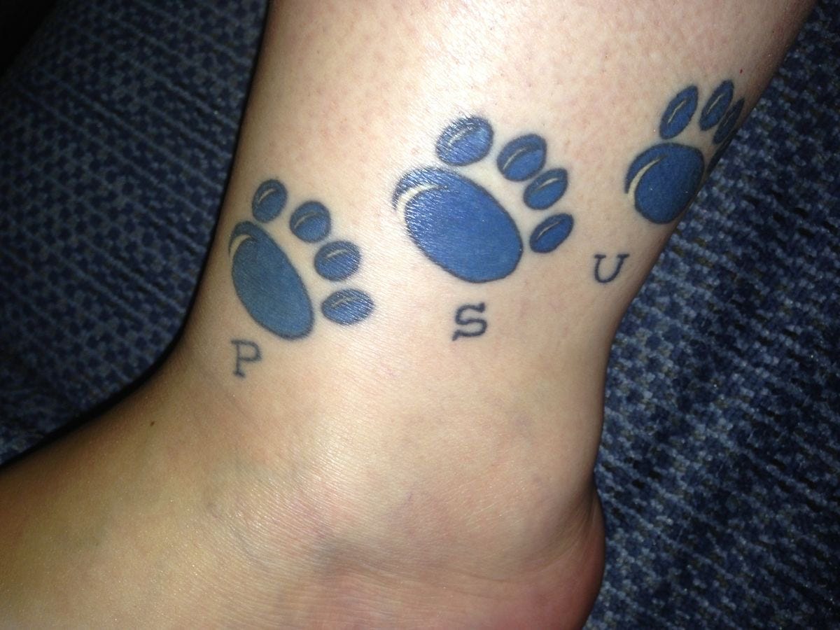 Ankle tattoo, Penn State logo three times like animal tracks, saying “PSU” beneath Ankle tattoo, Penn State logo three times like animal tracks, saying “PSU” beneath