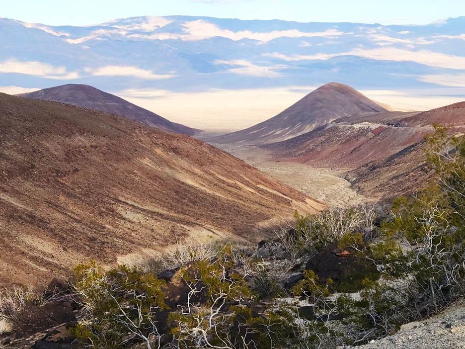 A landscape of a desert

AI-generated content may be incorrect.