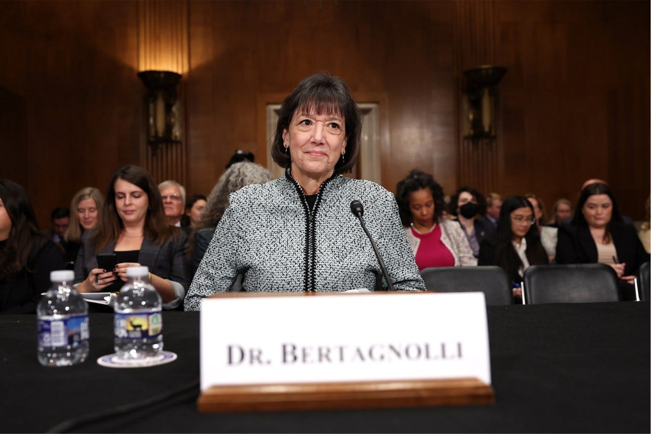 A photo of Monica Bertagnolli sitting inside of a Senate committee room with her nameplate visible in front of her. A photo of Monica Bertagnolli sitting inside of a Senate committee room with her nameplate visible in front of her.