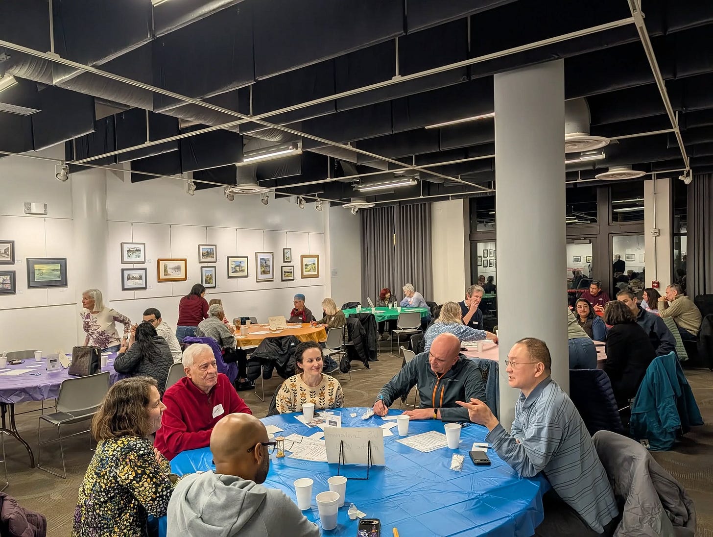 A table of people at BB talking happily