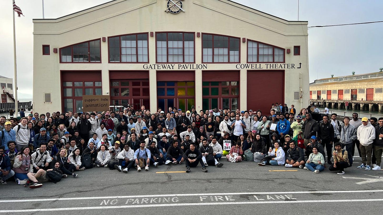 buildspacers posing for a group photo outside of the gateway pavilion in fisherman's wharf, san francisco