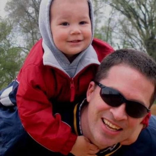 May be an image of 1 person, baby and smiling