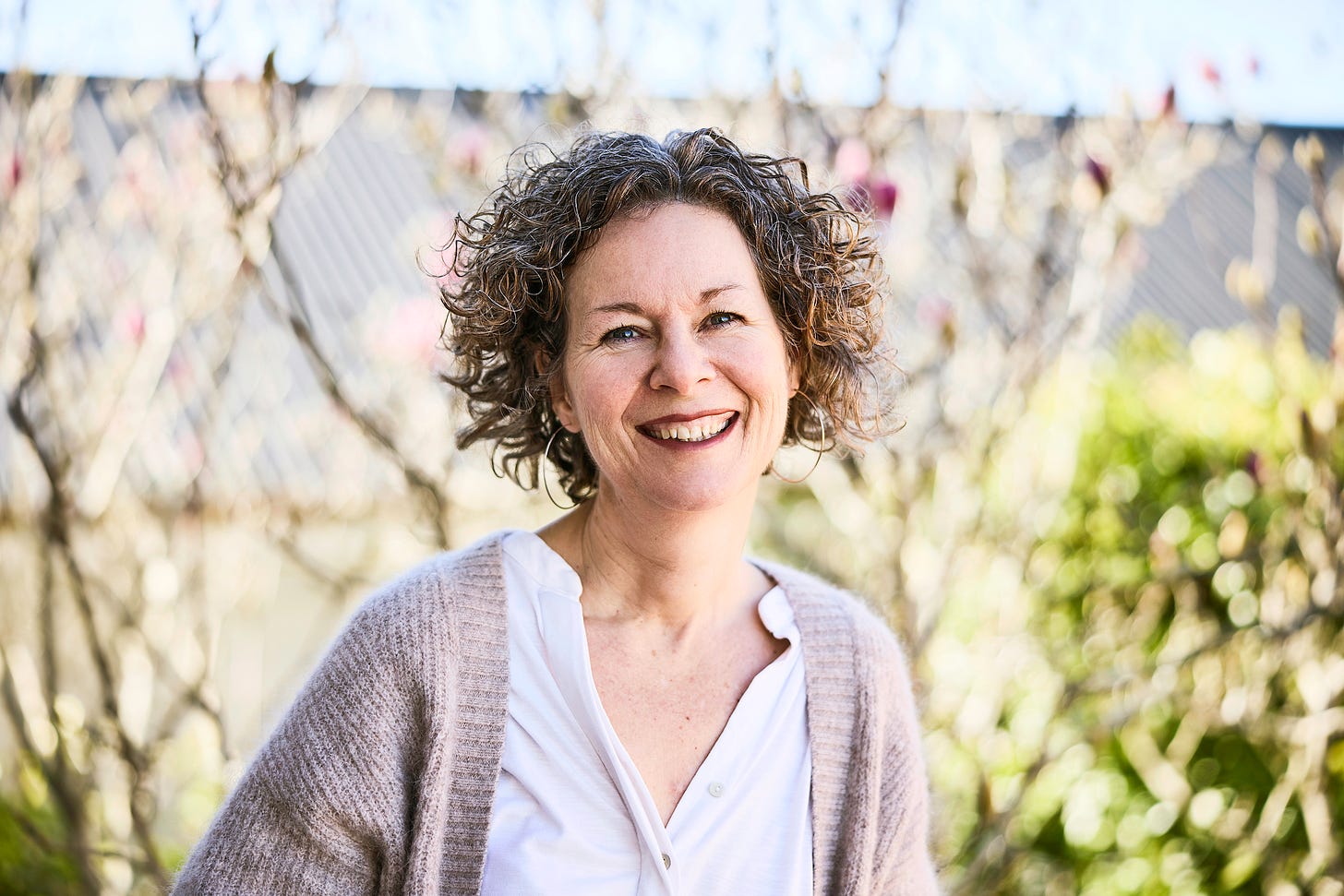 Dr Vicki Connop smiling outdoors.