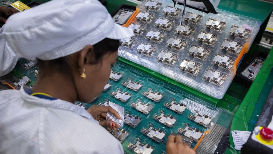 An employee assembles and inspects mobile phone parts at Rising Stars Mobile India Pvt. Ltd. at Sri City in the state of Andhra Pradesh in India on Thursday, 11th July, 2019. Photographer-Karen Dias/Bloomberg via Getty Images An employee works at the factory of Rising Stars Mobile India Pvt., a unit of Foxconn Technology Co., in Sri City, Andhra Pradesh, India, on Thursday, July 11, 2019. Foxconn, also known as Hon Hai Precision Industry Co., opened its first India factory four years ago, it now operates An employee assembles and inspects mobile phone parts at Rising Stars Mobile India Pvt. Ltd. at Sri City in the state of Andhra Pradesh in India on Thursday, 11th July, 2019. Photographer-Karen Dias/Bloomberg via Getty Images An employee works at the factory of Rising Stars Mobile India Pvt., a unit of Foxconn Technology Co., in Sri City, Andhra Pradesh, India, on Thursday, July 11, 2019. Foxconn, also known as Hon Hai Precision Industry Co., opened its first India factory four years ago, it now operates