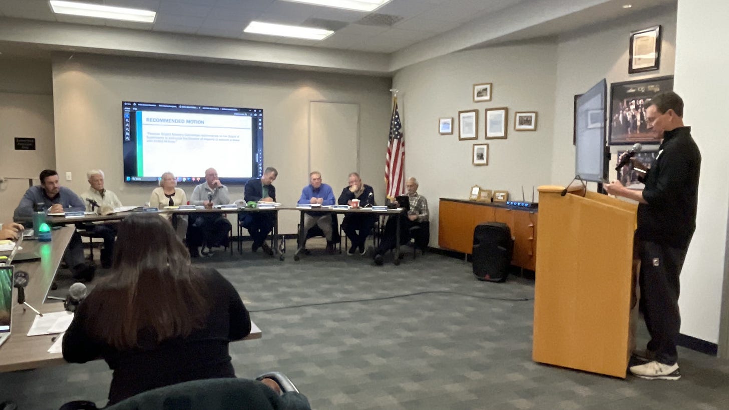 An unidentified man speaks against the United Airlines lease with San Diego County during the Palomar Airport Advisory Committee meeting on Thursday at the Carlsbad Chamber of Commerce. Steve Puterski photo
