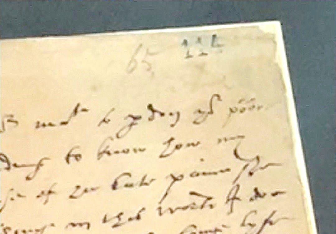 Photo of the letter showing the dashes over the 'oo's