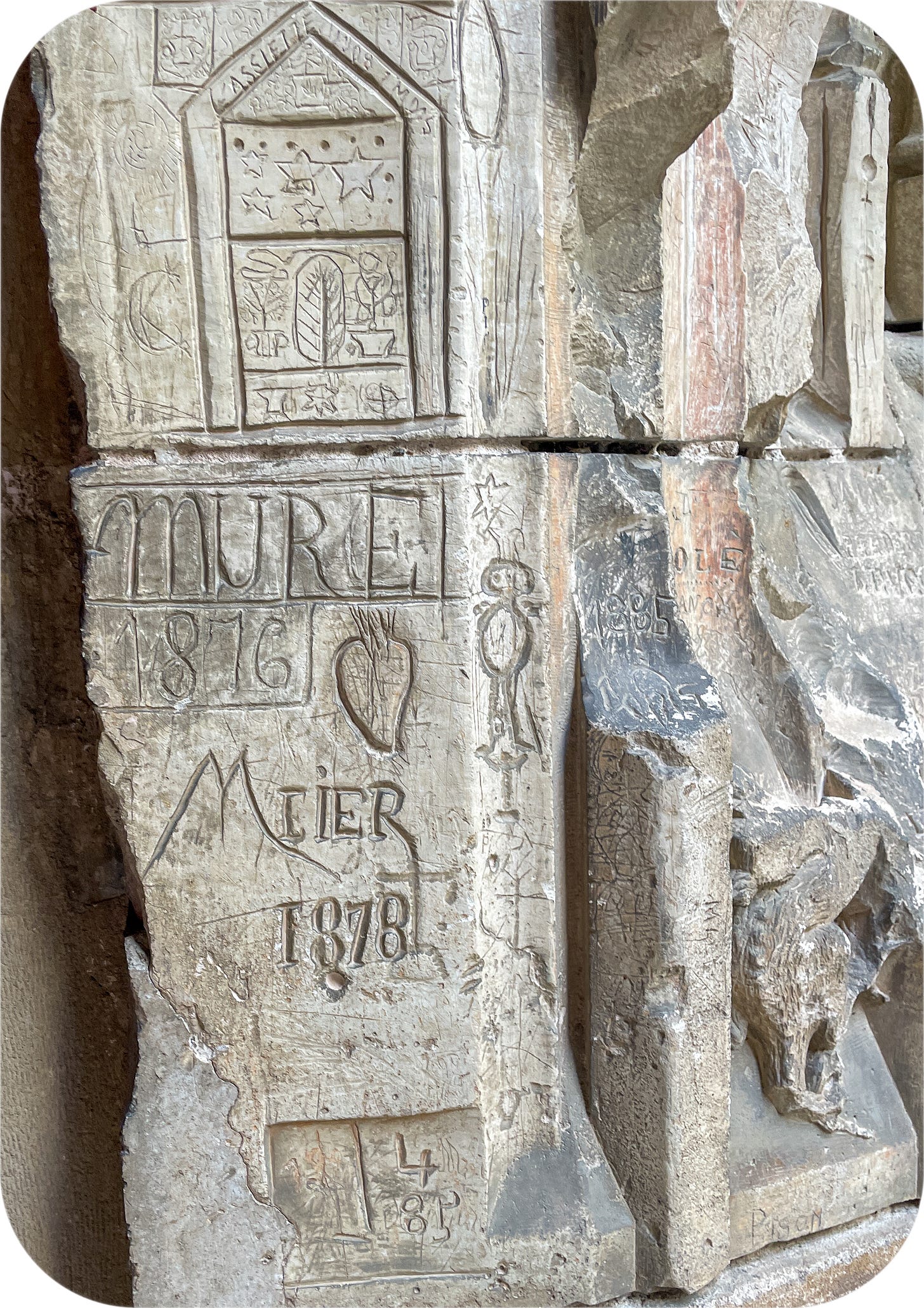 Carved graffiti at the Chateau de Tarascon, France.