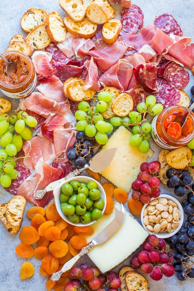 Easy Spanish Cheese Board — Learn my TIPS and tricks to create the PERFECT cheese board!! From prosciutto to manchego and everything in between, this Spanish appetizer board has ALL the goodies! It'll be a major hit at your next party!! Easy Spanish Cheese Board — Learn my TIPS and tricks to create the PERFECT cheese board!! From prosciutto to manchego and everything in between, this Spanish appetizer board has ALL the goodies! It'll be a major hit at your next party!!
