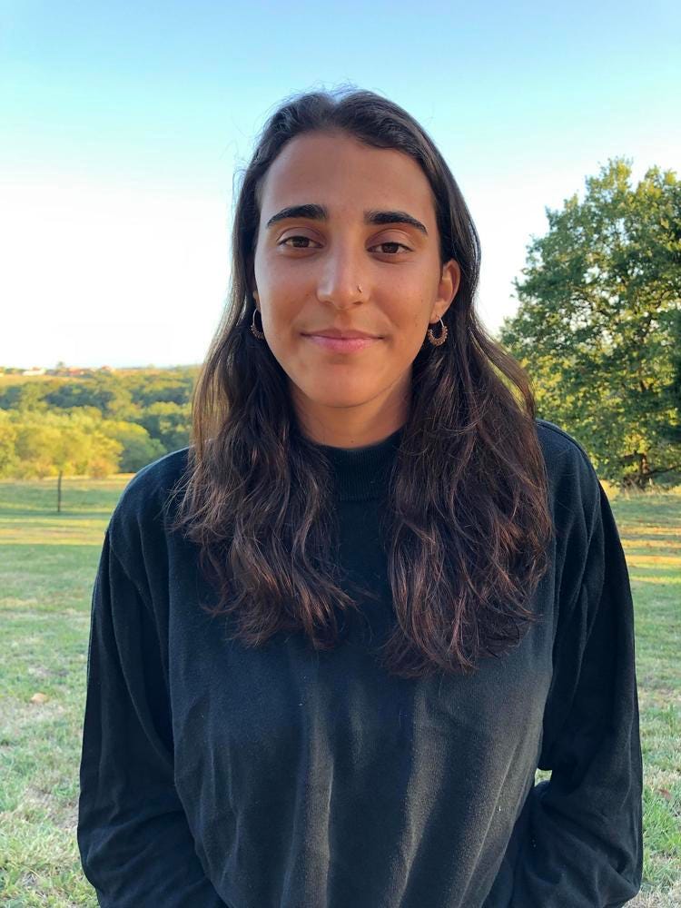 Image of the author standing in a field