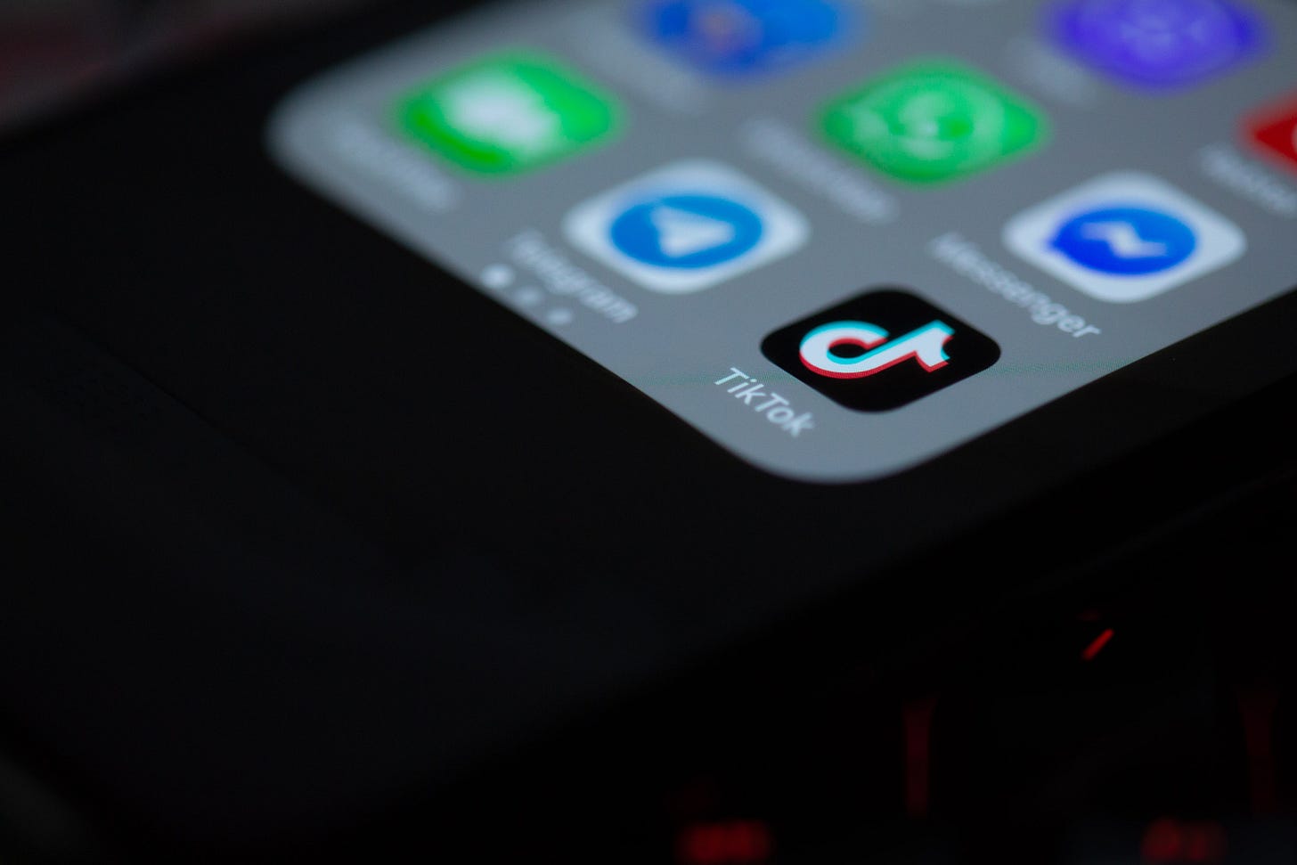 Close-up of a phone screen, with the Tik Tok app in focus Close-up of a phone screen, with the Tik Tok app in focus