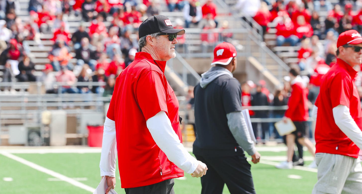 Wisconsin Badgers offensive coordinator Jeff Grimes walks on the field during the Spring Showcase.